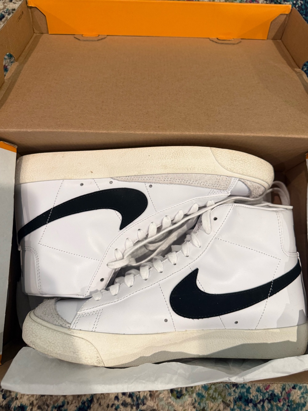 Nike White High-Top Sneakers with Black Swoosh